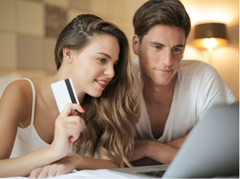 couple signing up for online payment subscription
